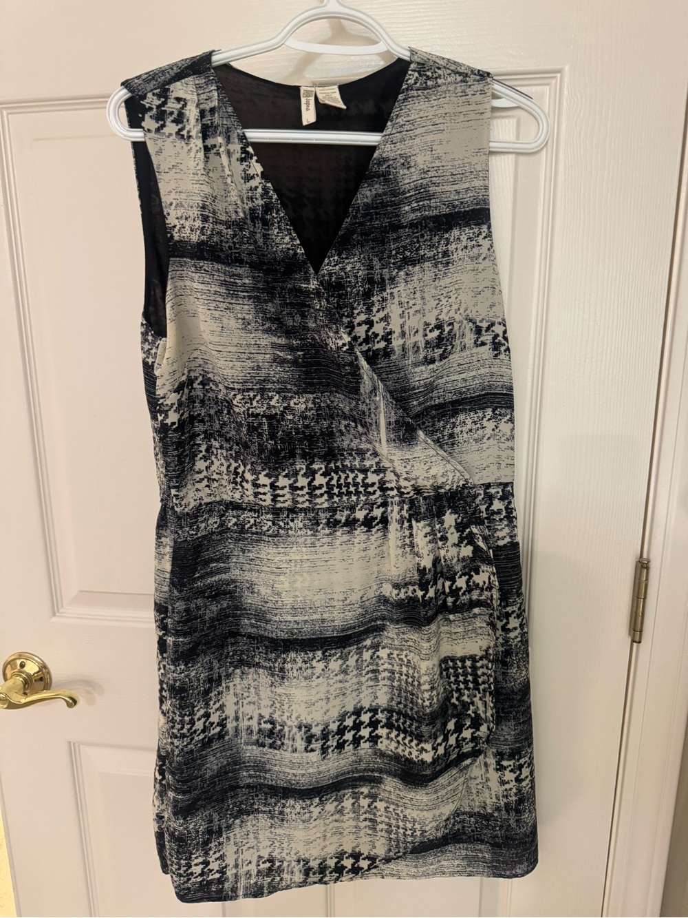 Japna Black and White Sleeveless Wrap-Front Mini Dress